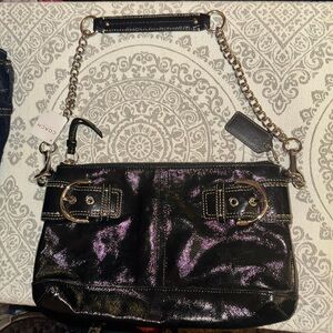 Black coach shoulder bag medium size.